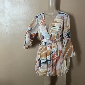 NWT Fashion Nova Stay beautiful Flowy Romper